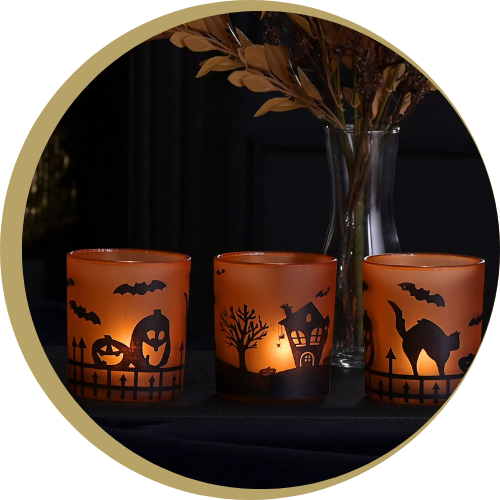Scented candles with Halloween engravings