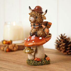 Country Living Highland Cow on Mushroom