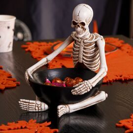 Skeleton Figurine Holding Bowl