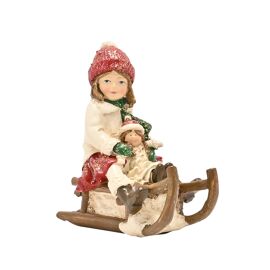 Victorian Girl On Sledge Figurine