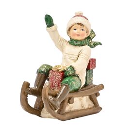 Victorian Boy On Sledge Figurine