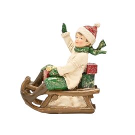 Victorian Boy On Sledge Figurine