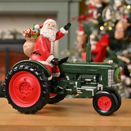 Large Santa Driving a Tractor Figurine